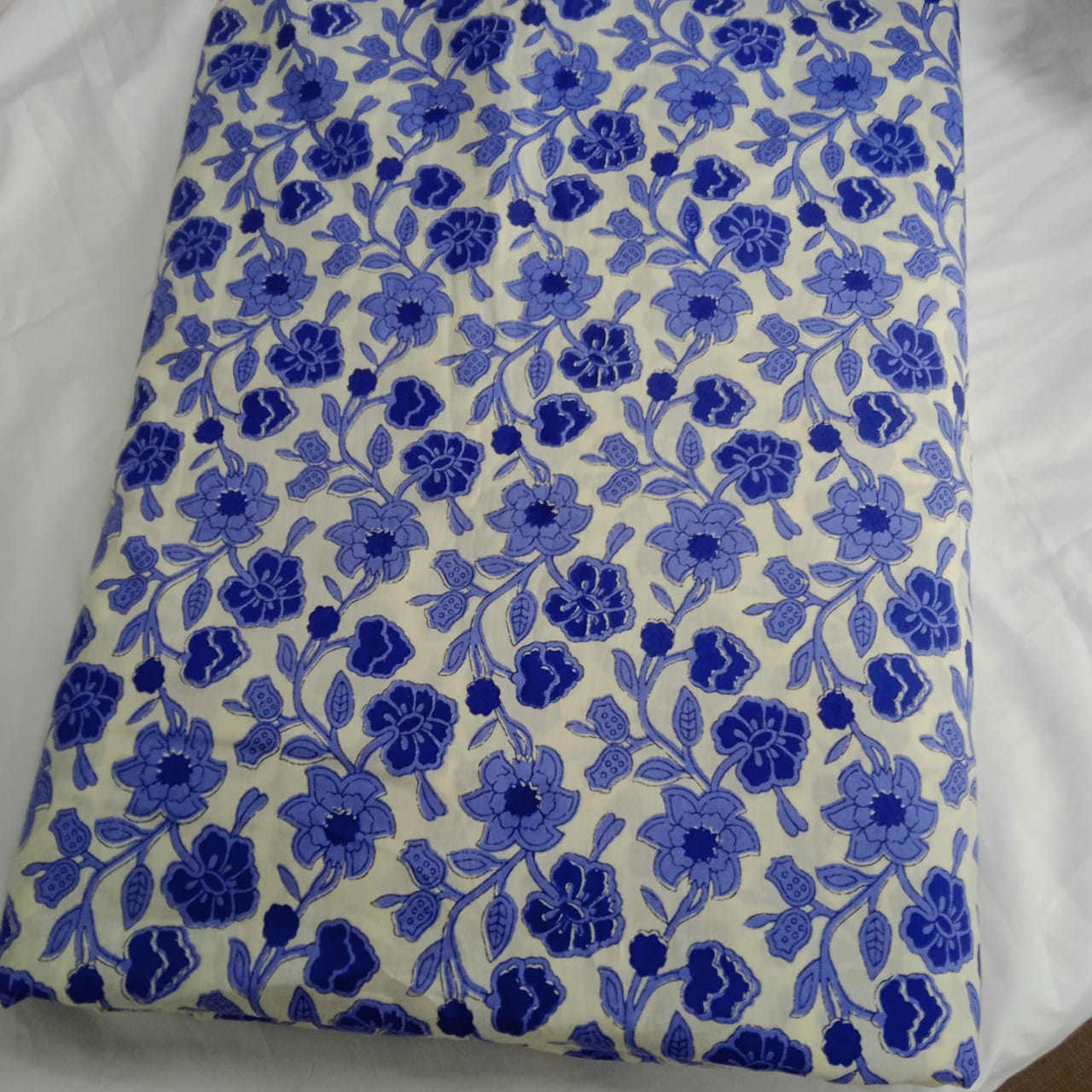 Soft Blue Bloom on White Cotton Fabric