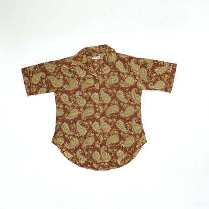 Brown shirt with beige pattern on a white background
