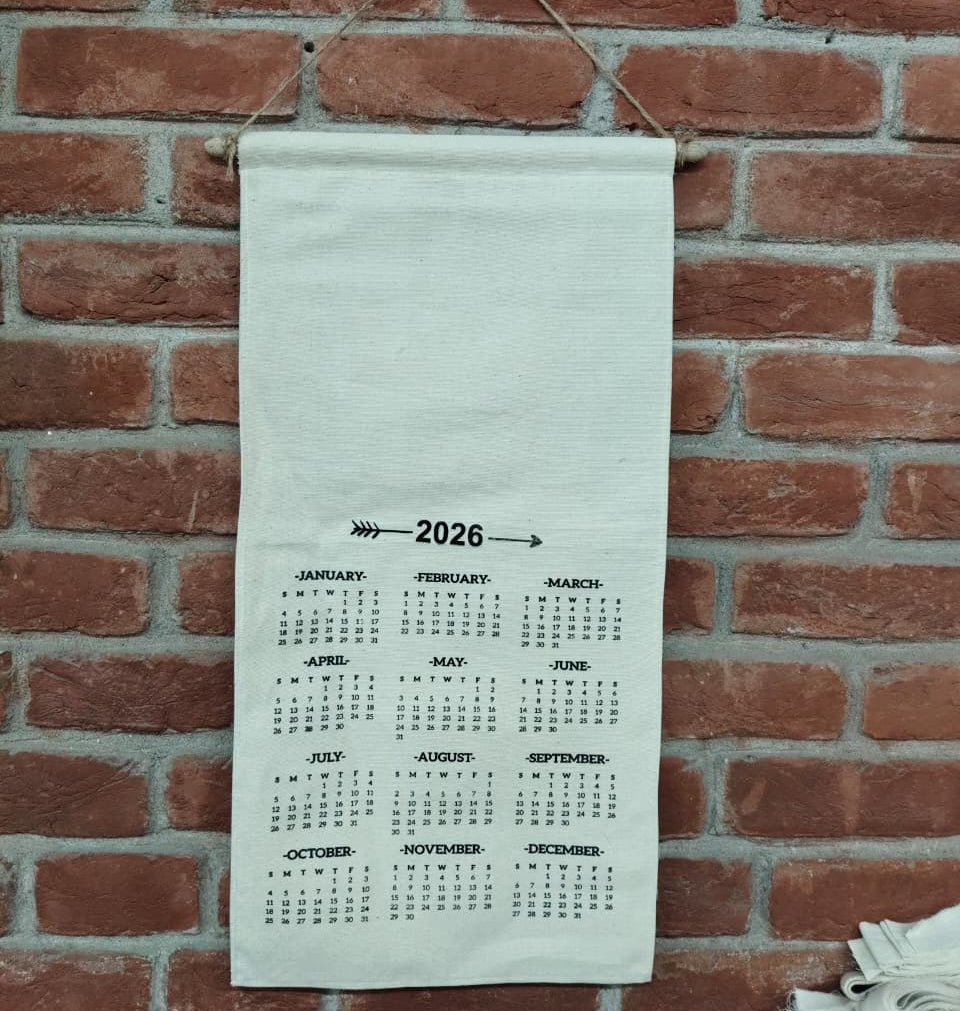 Calendar for 2026 hanging on a brick wall