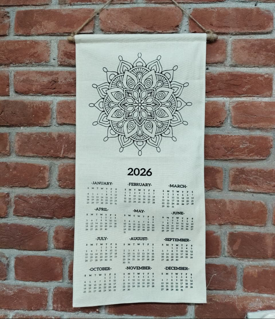 2026 calendar with mandala design on a brick wall
